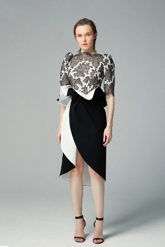 Laced top with asymmetric short skirt